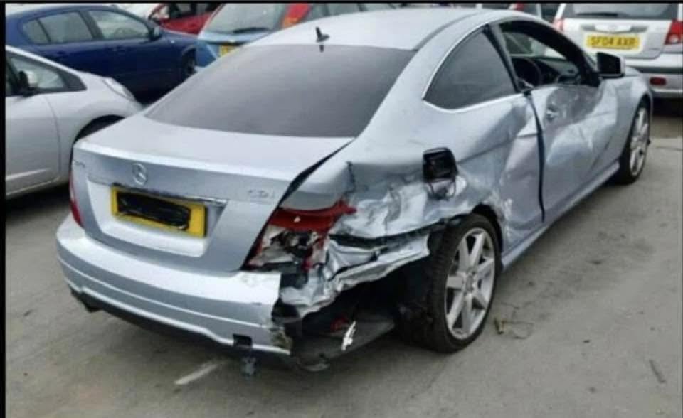 Mercedes C-Class rear quarter damage before bodywork repair at EE Motors Northampton